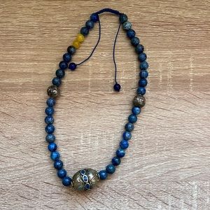 Lapis lazuli beaded necklace. Adjustable size. With Tibetan bead.